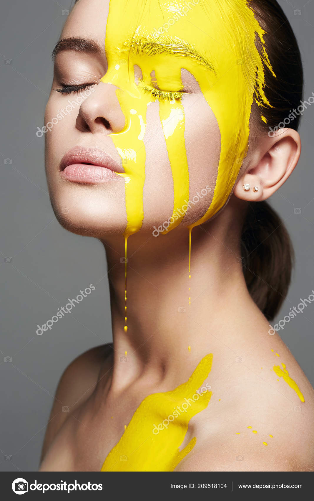 Young Woman Yellow Paint Liquid Paint Flowing Beautiful Face Body Stock  Photo by ©EugenePartyzan 209518104